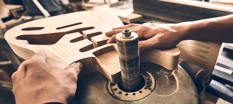 case study guitar maker wooden guitar