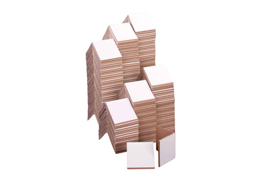 https://www.shorr.com/wp-content/uploads/products-pallet-unitization-cornerboard-edge-protectors-stacks-white-corrugated-protection-shorr-packaging-1.jpg